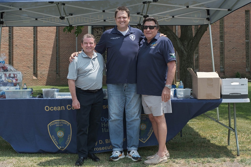 HOPE Sheds Light co-founders Stephen Willis and Ron Rosetto with Ocean County Prosecutor Bradley Billhimer
